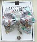 Helping Hands & Daisies Badge Reel